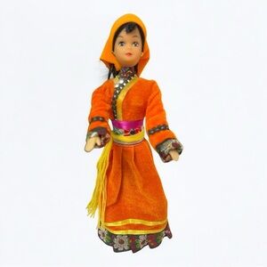 Chinese Oroqen Figurine Cultural Ethnic Doll Orange Dress Wood Base Movable Arms